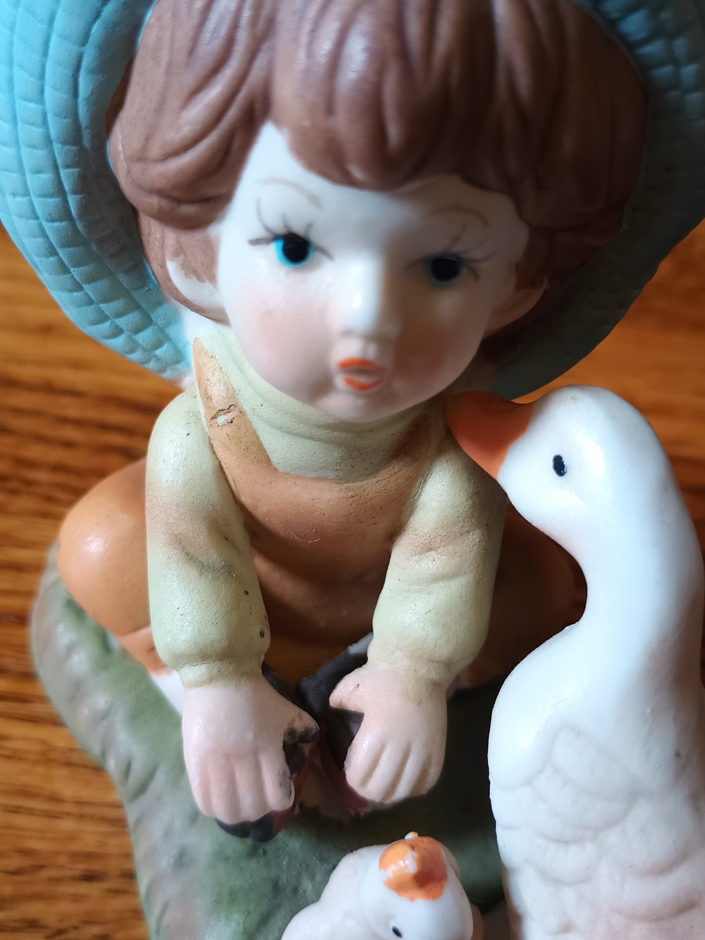 Hand-Painted Ceramic Boy and Geese Figurine in Blue and Green - Picture 6 of 9
